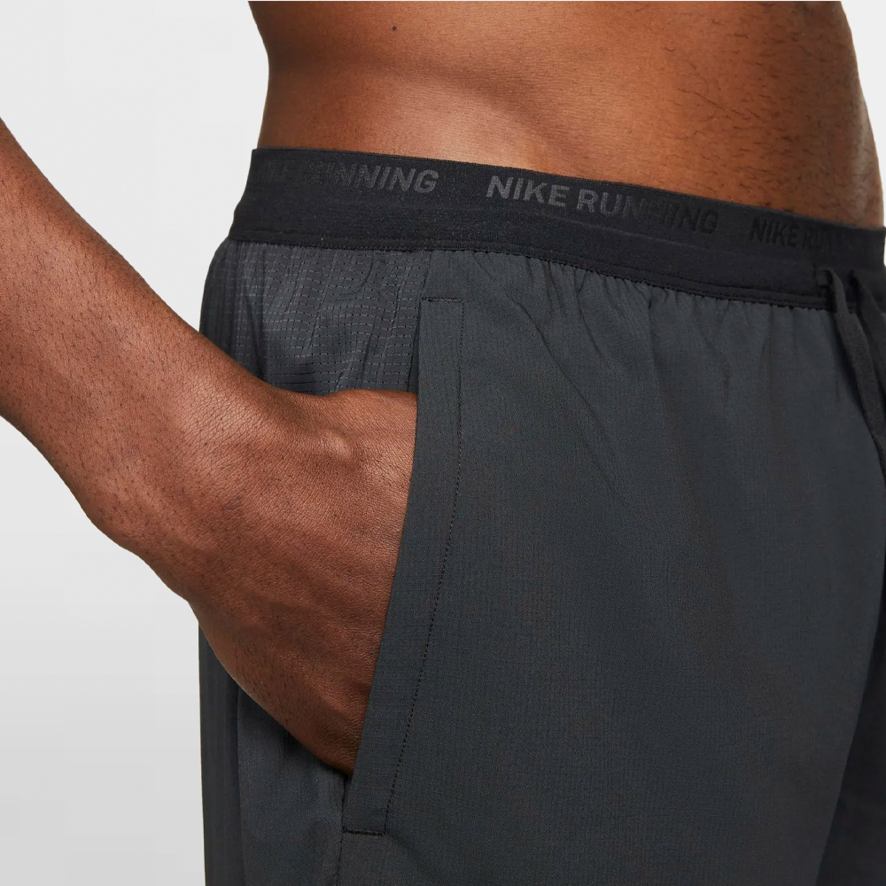NIKE PANT. CORTO DF STRIDE 5