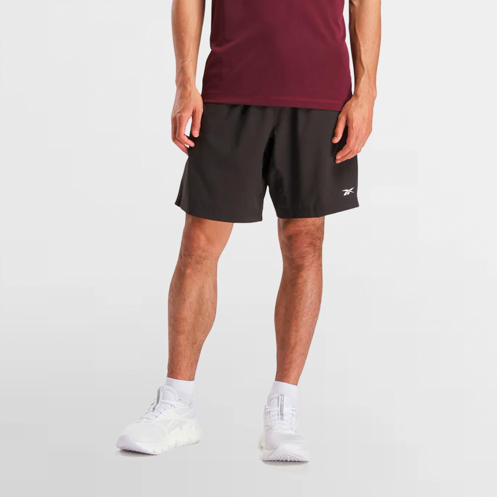 REEBOK PANT. CORTO TRAIN 9 WOVEN SHORTS - 100243118
