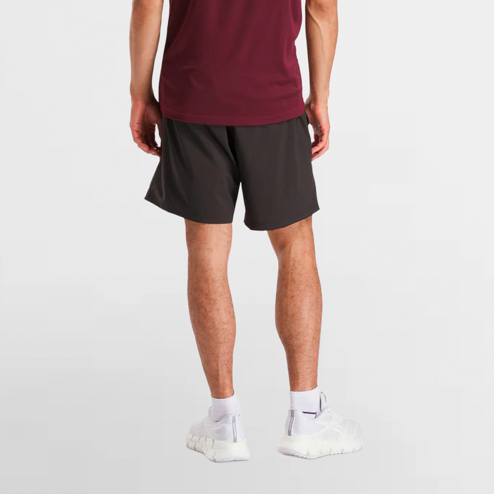 REEBOK PANT. CORTO TRAIN 9 WOVEN SHORTS - 100243118