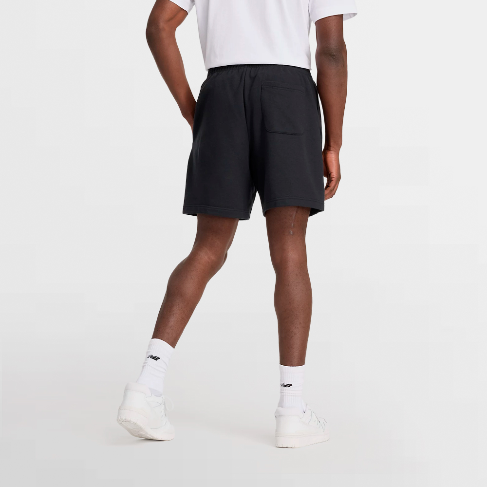 NEW BALANCE PANT. CORTO FRENCH TERRY SHORT 7 INCH - MS41520 BK
