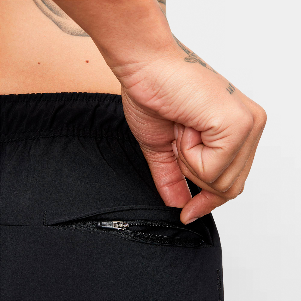 NIKE PANT. CORTO UNLIMITED - DV9330 010
