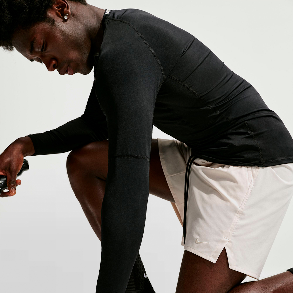 NIKE PANT. CORTO UNLIMITED 7