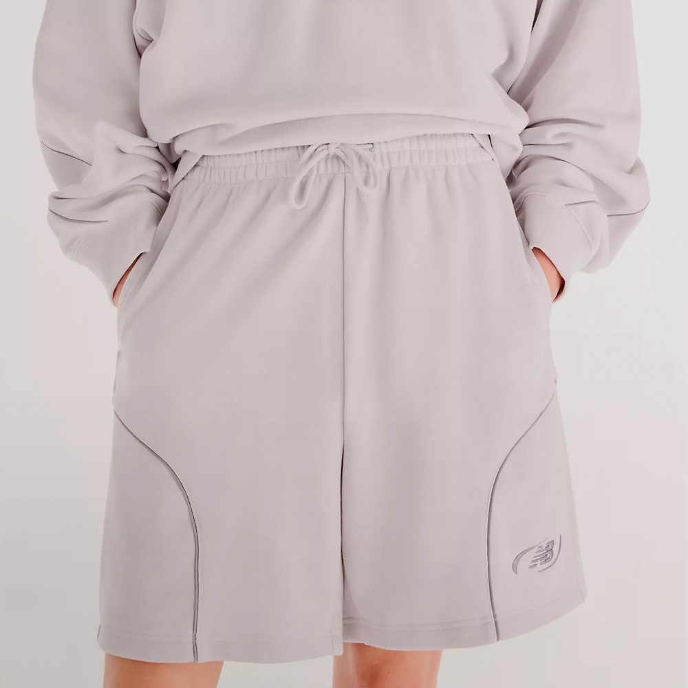 NEW BALANCE PANT. CORTO FRENCH TERRY SHORT 7