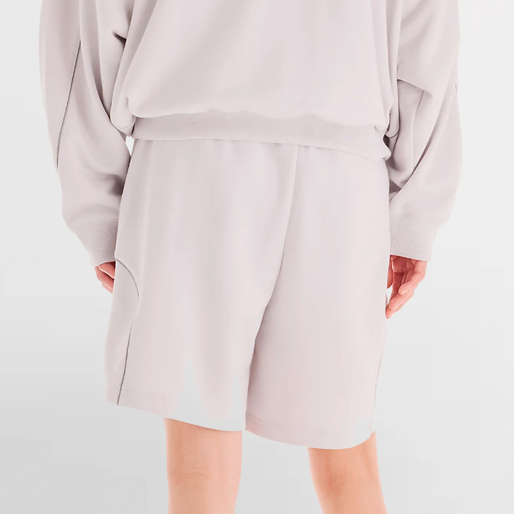 NEW BALANCE PANT. CORTO FRENCH TERRY SHORT 7